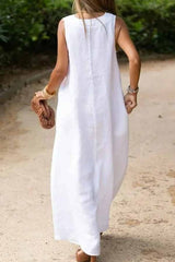 Deep v-neck sleeveless long white cotton and linen dress